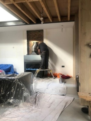 Installation in progress and flue exterior